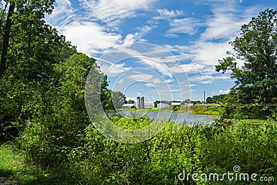 Barn, Two Silos and Farm Pond Stock Photo